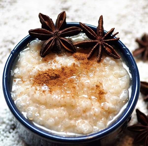 Tapioca pudding in bowl with spice on top
