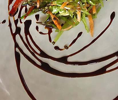 balsamic salad dressing art swirl on plate