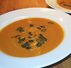 pumpkin soup with pumpkin seed garnish picture