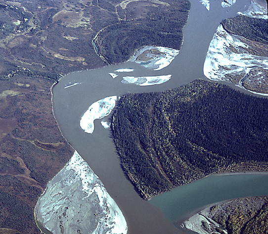 aerial in alaska shows muddy river meeting green river